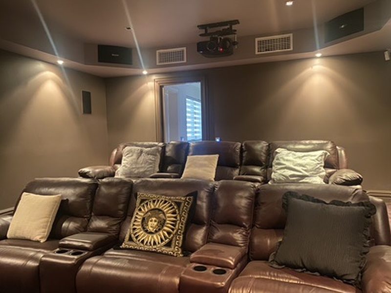 Private home cinema with integrated AV, recessed projector and discrete in-ceiling speakers — Better Home Technology install